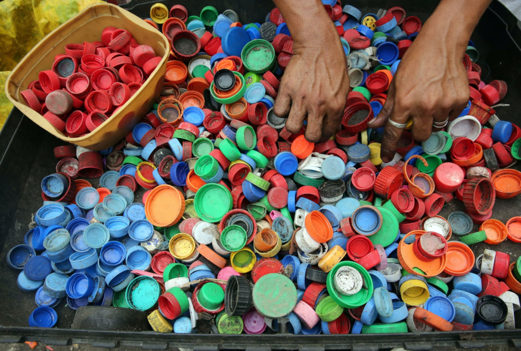 a pile of plastic bottle caps