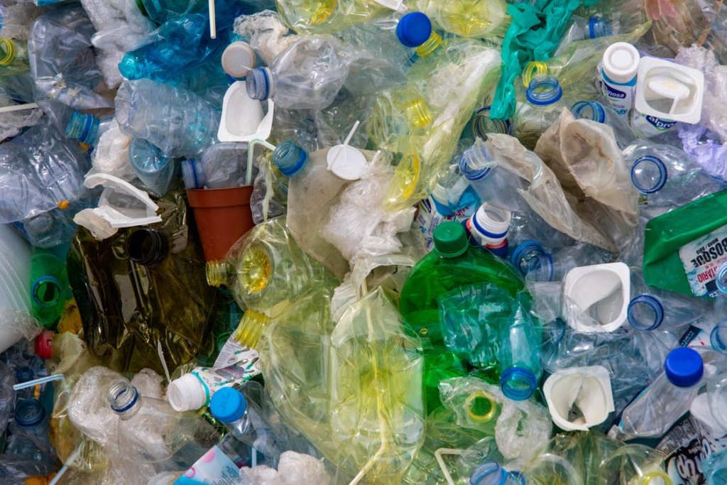 a large pile full of colorful plastic products